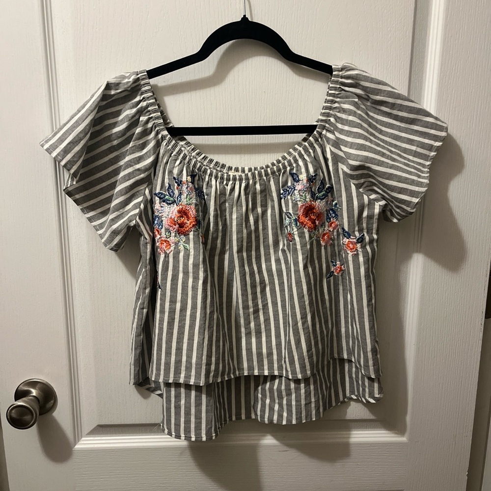 The Cove embroidered Top gray and white striped with floral embroidered details